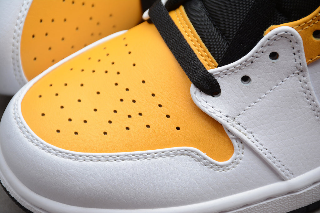 Air Jordan 1 Mid – Amarillo / Blanco / Negro