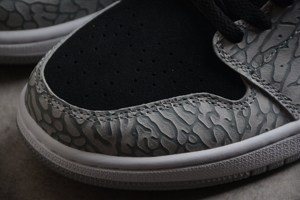Air Jordan 1 Mid – Gris / Negro