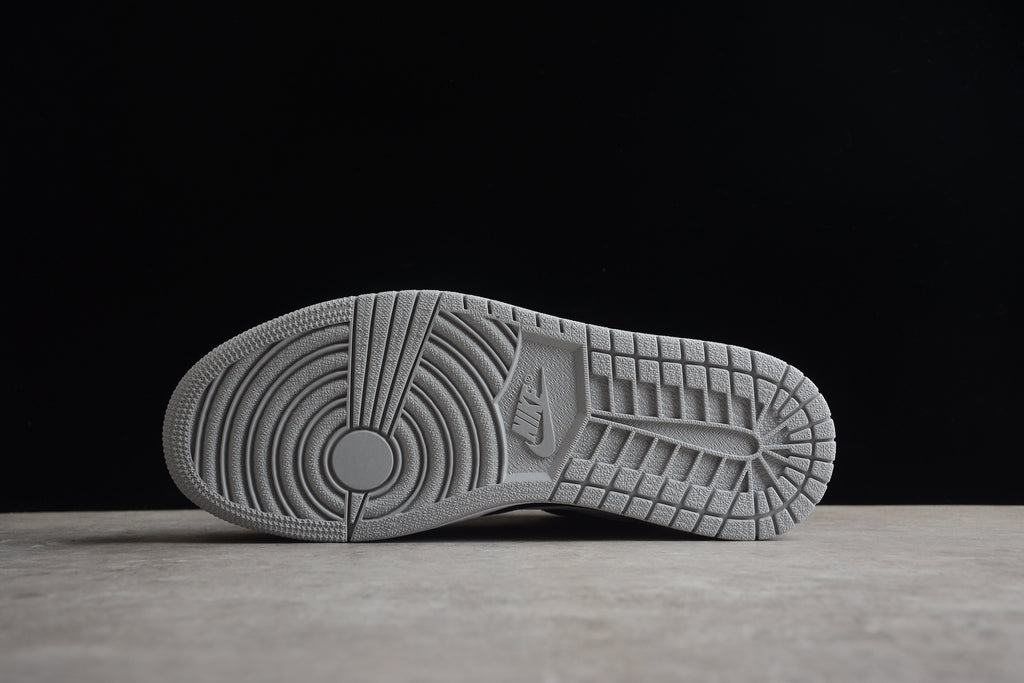 Air Jordan 1 Mid – Gris / Negro