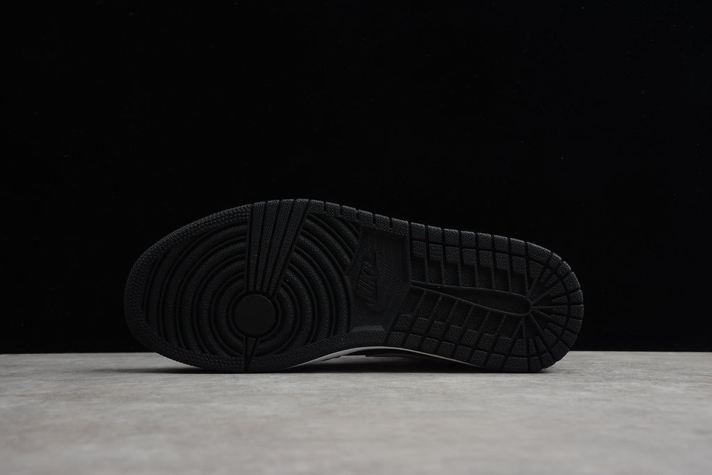 Air Jordan 1 Mid – Blanco / Negro