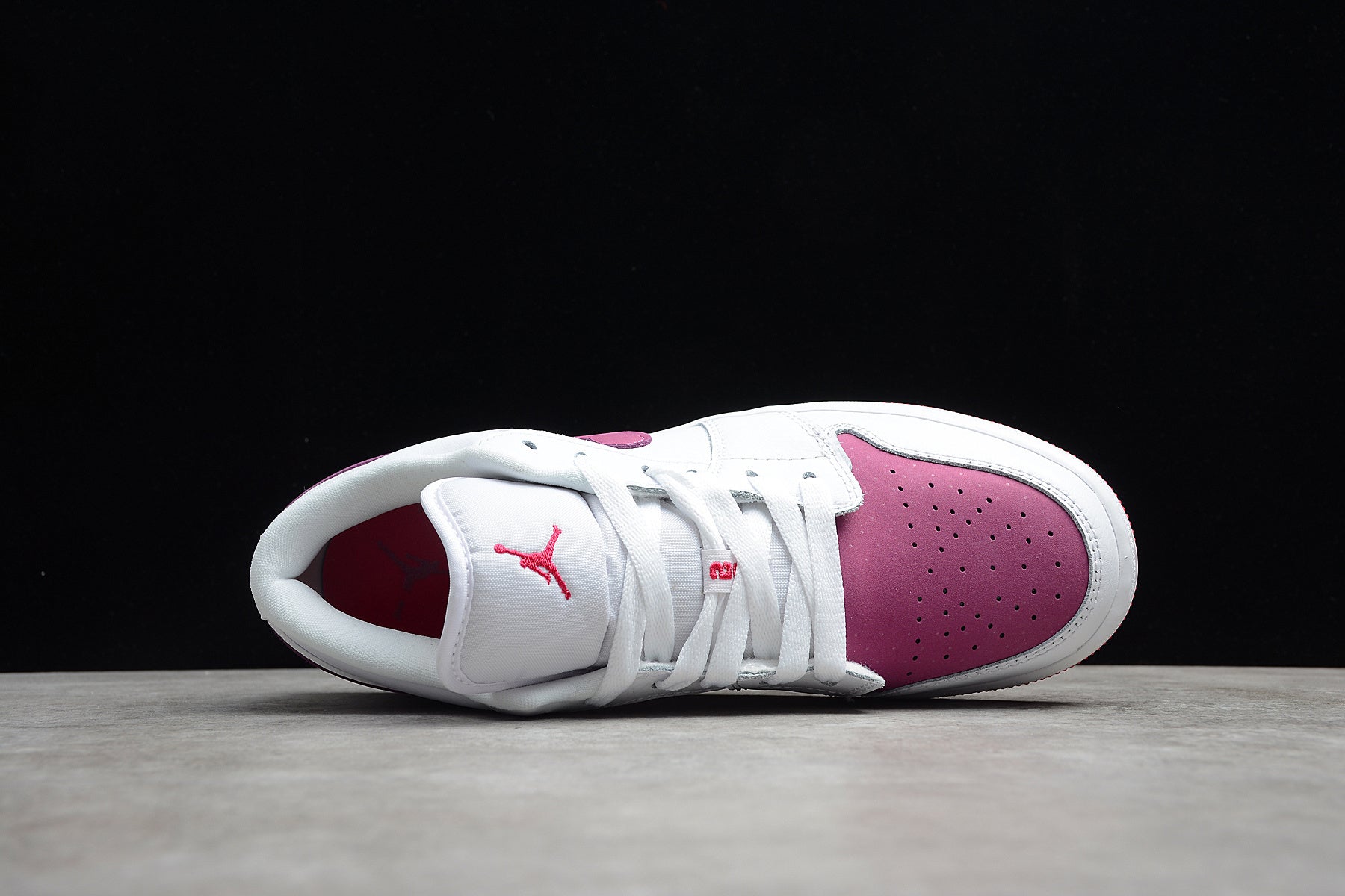 Jordan 1 Low – Blanco / Rosa
