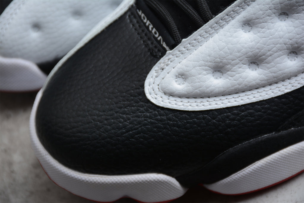 Air Jordan 13 – Blanco / Negro / Rojo