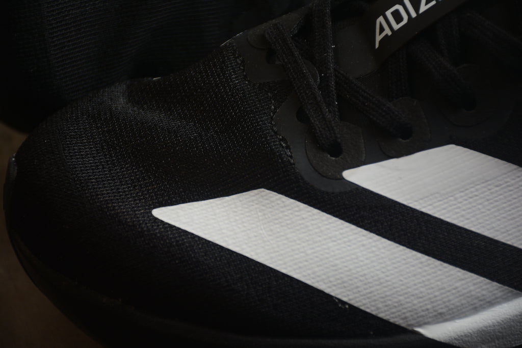 Adidas Adizero Evo SL – Negro / Blanco