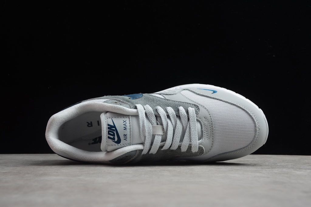Air Max 1 – Gris / Blanco