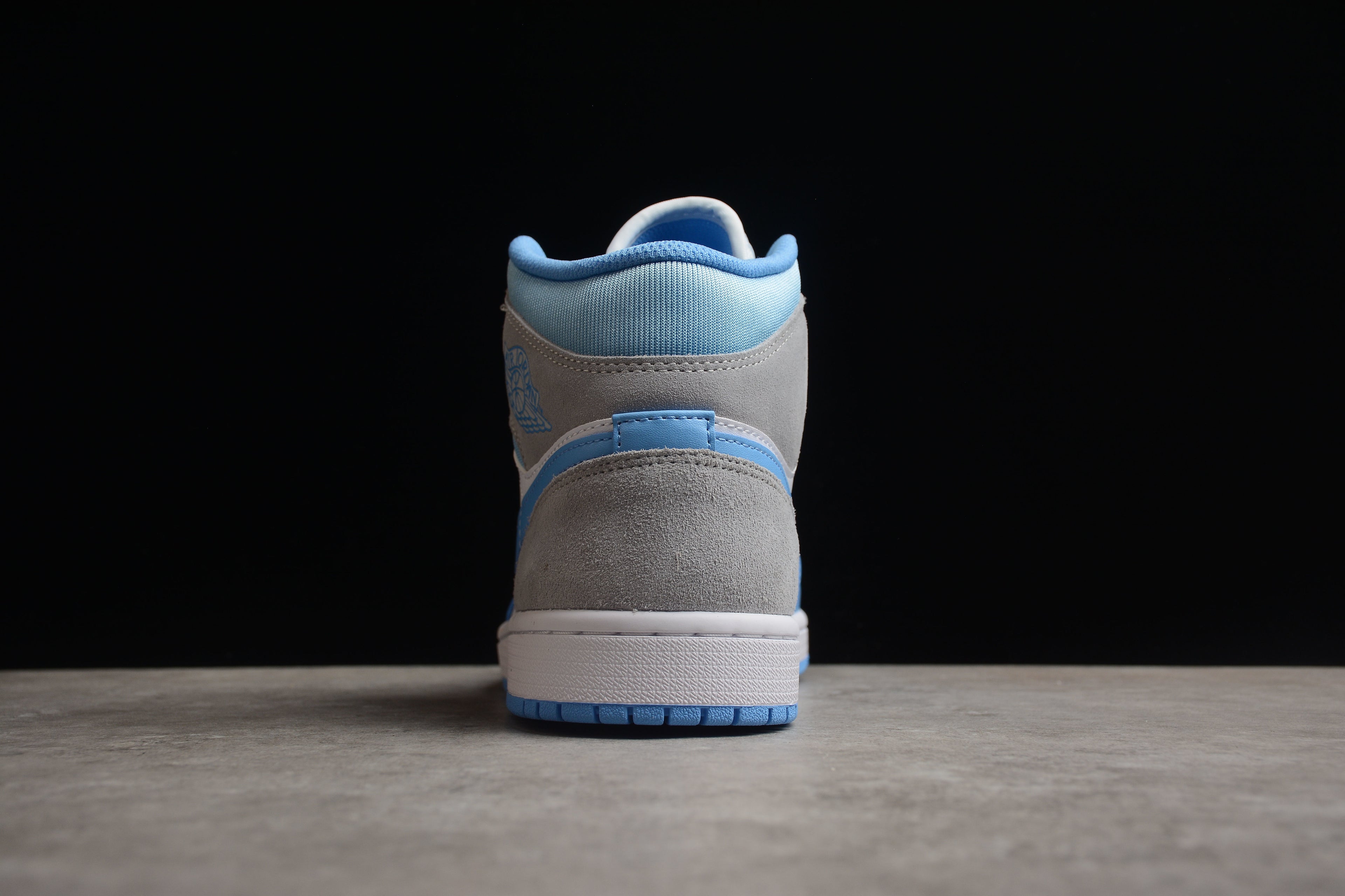 Air Jordan 1 Mid – Azul / Gris / Blanco
