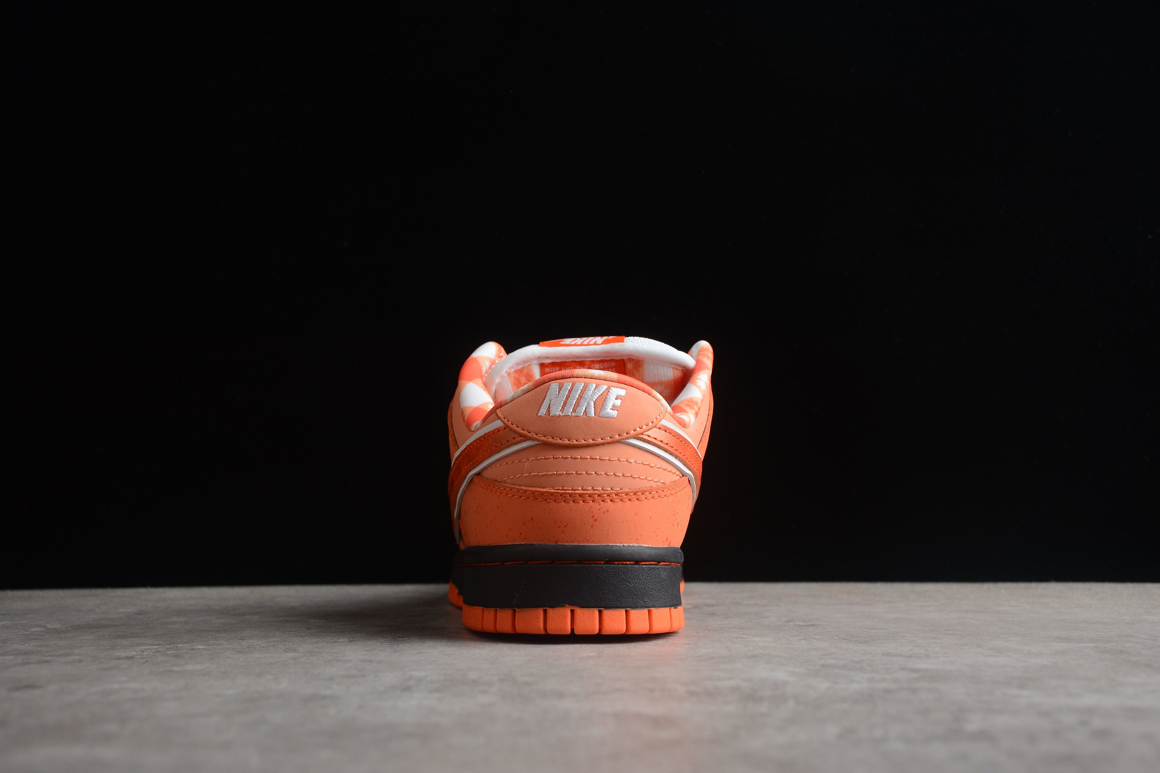 Dunk SB – Naranja / Blanco / Negro