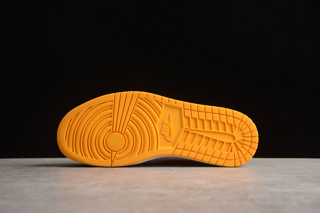 Jordan 1 Low – Amarillo / Blanco / Negro