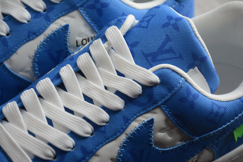 Air Force 1 Low LV – Blanco / Azul