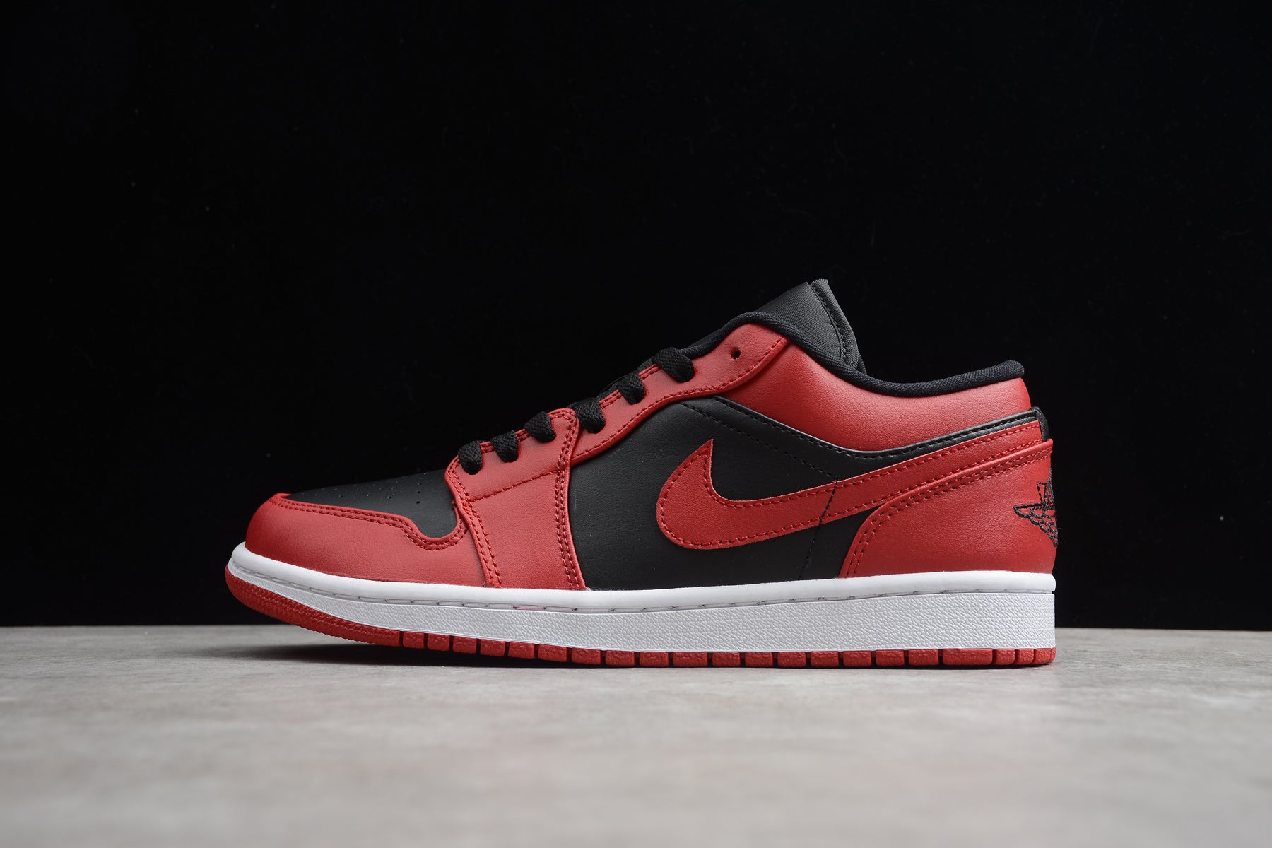 Jordan 1 Low – Rojo / Negro