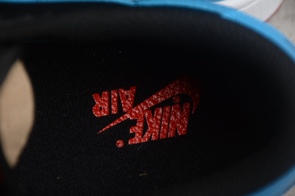 Jordan 1 Low – Negro / Azul / Rojo