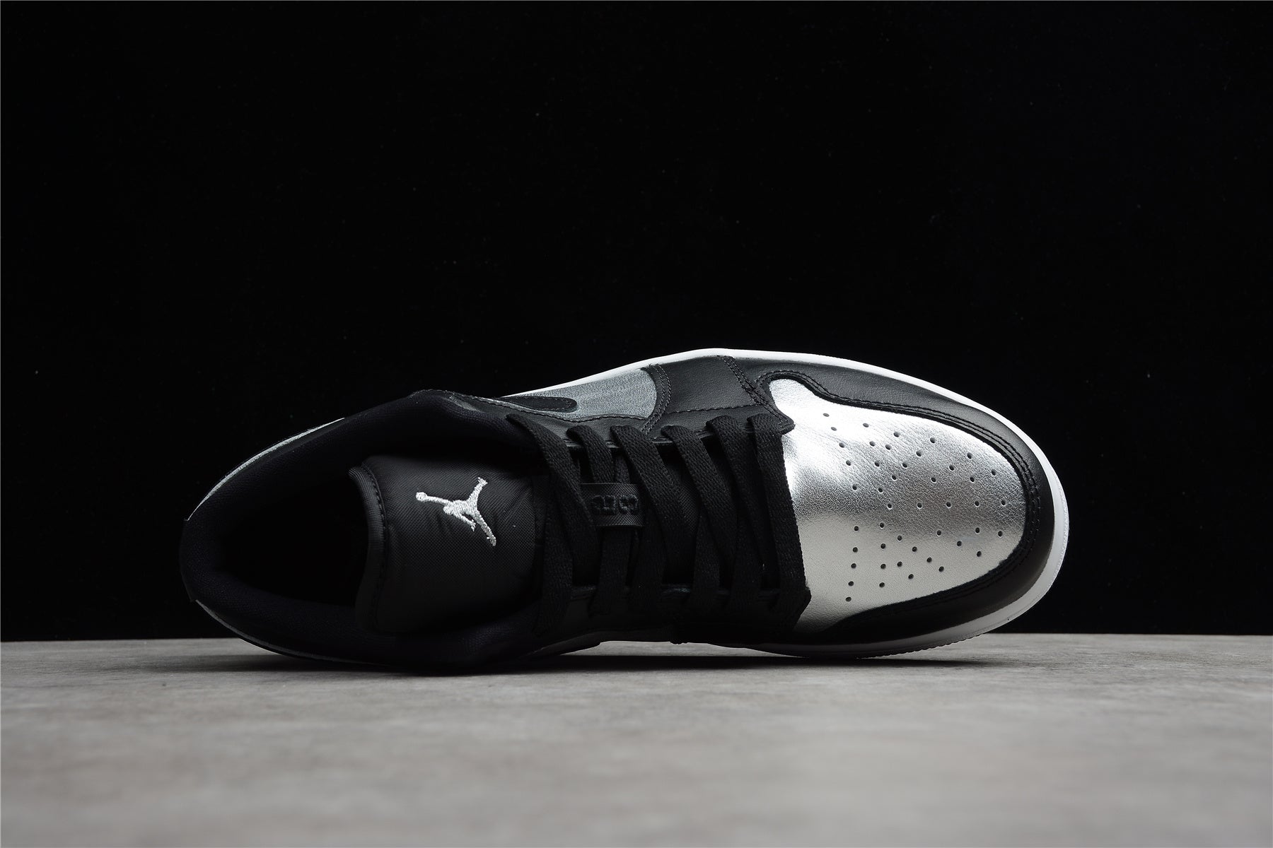 Jordan 1 Low – Negro / Plata