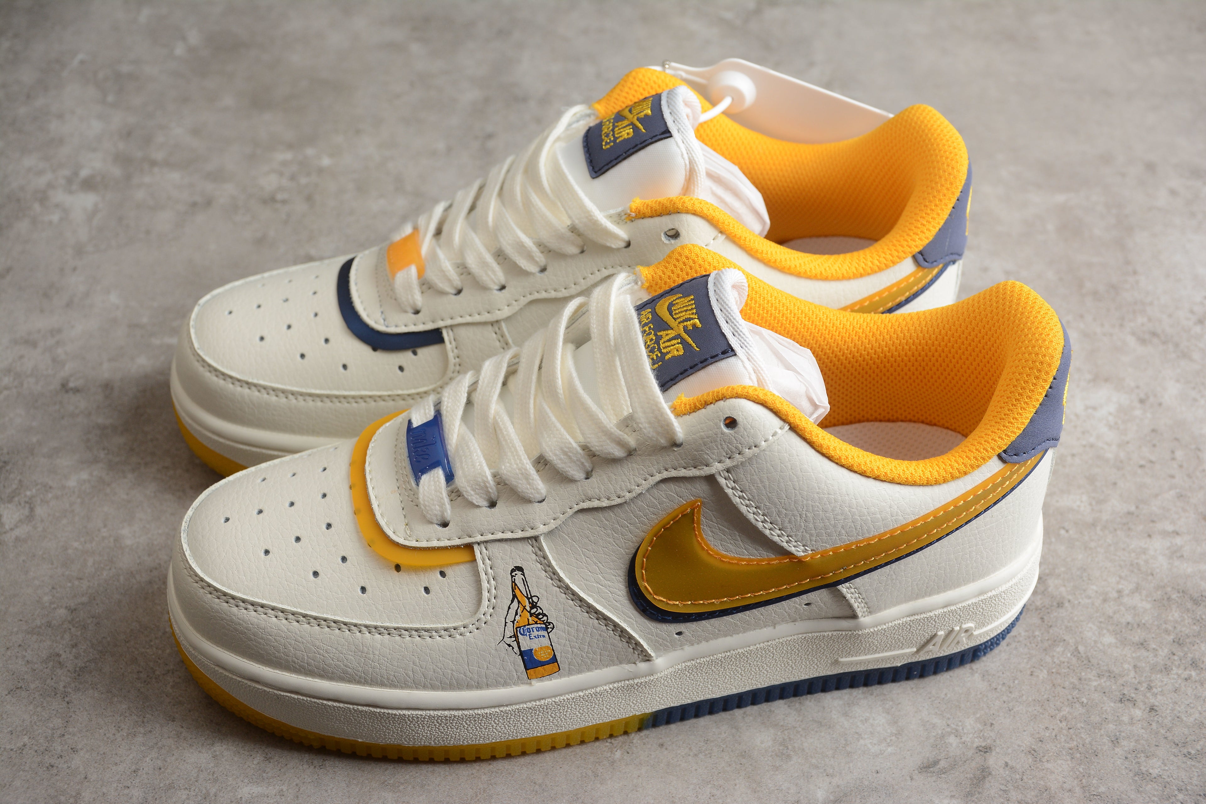 Nike Air Force 1 Low – Blanco / Amarillo / Azul