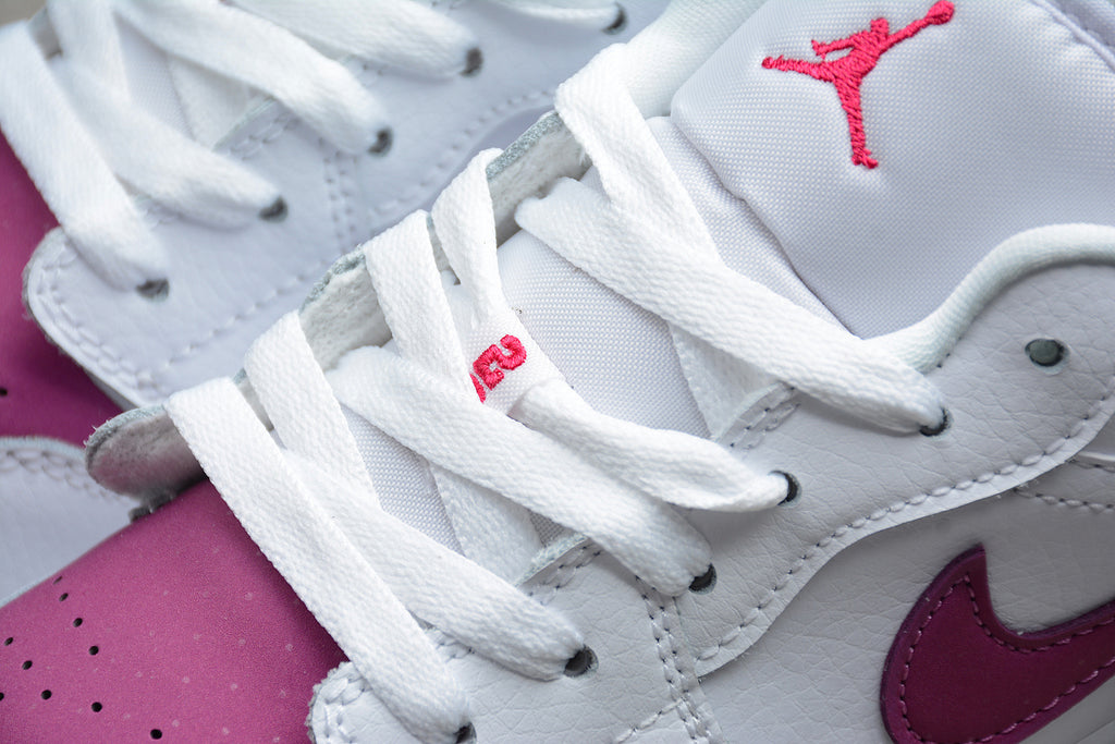 Jordan 1 Low – Blanco / Rosa