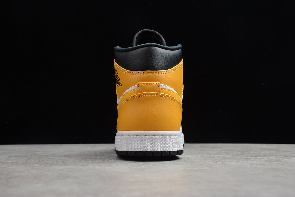 Air Jordan 1 Mid – Amarillo / Blanco / Negro