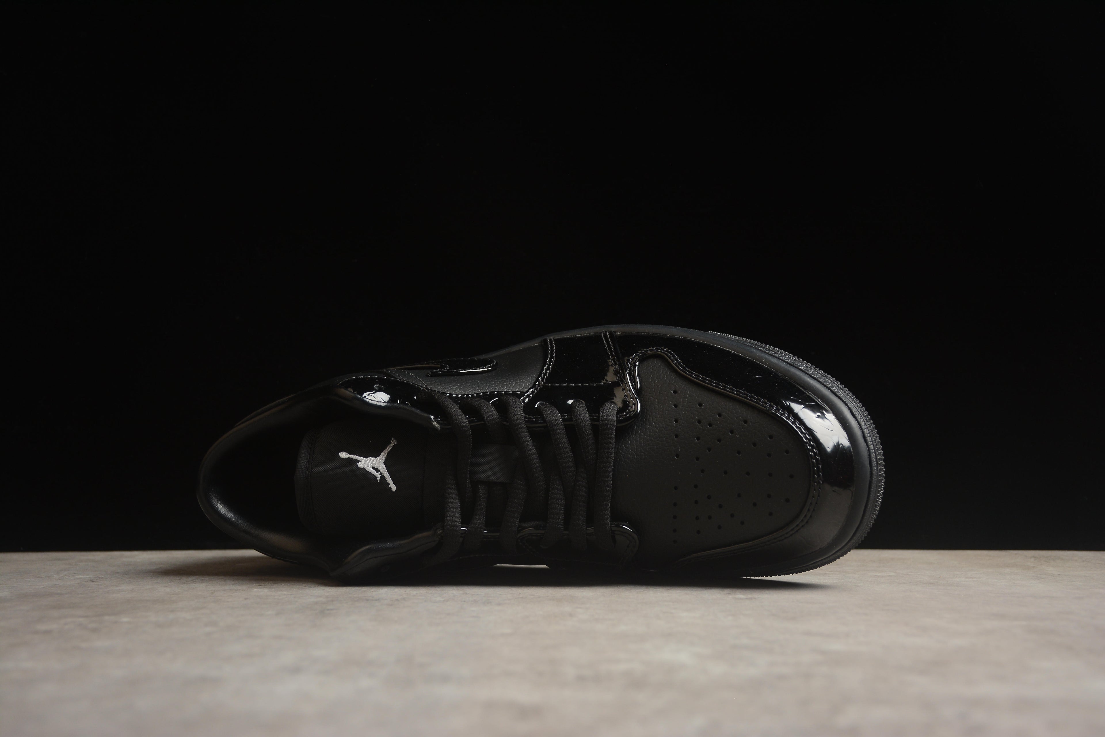Jordan 1 Low – Negro Brillante