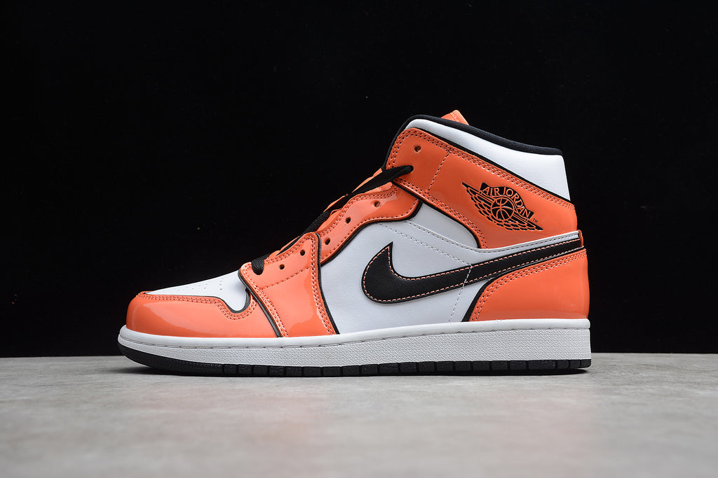 Air Jordan 1 Mid – Naranja / Negro