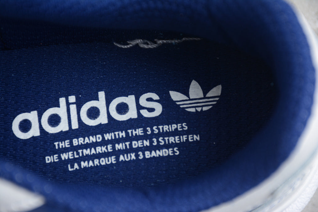 Adidas Forum – Blanco con Detalles Azules