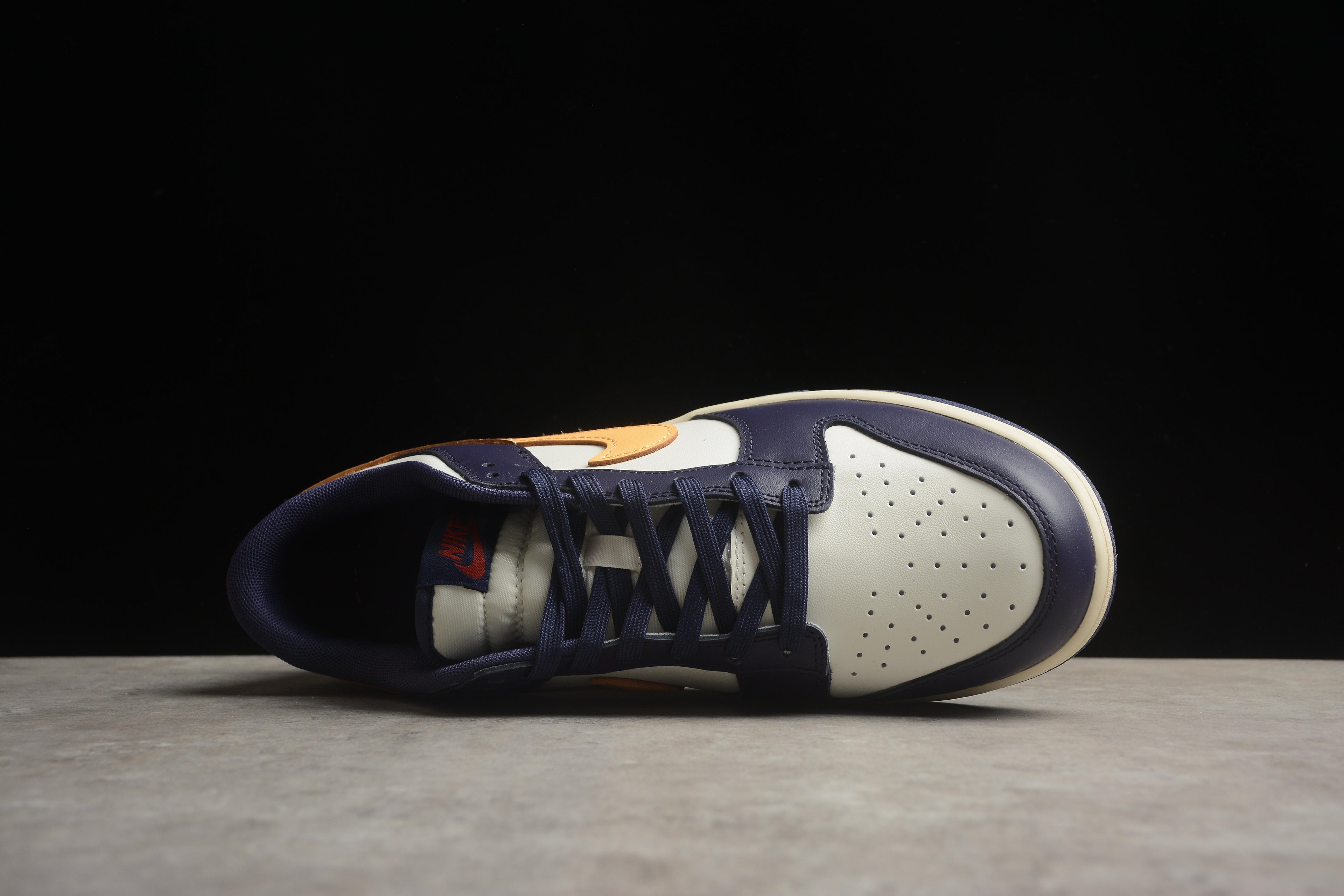Dunk SB – Azul Oscuro / Blanco / Amarillo