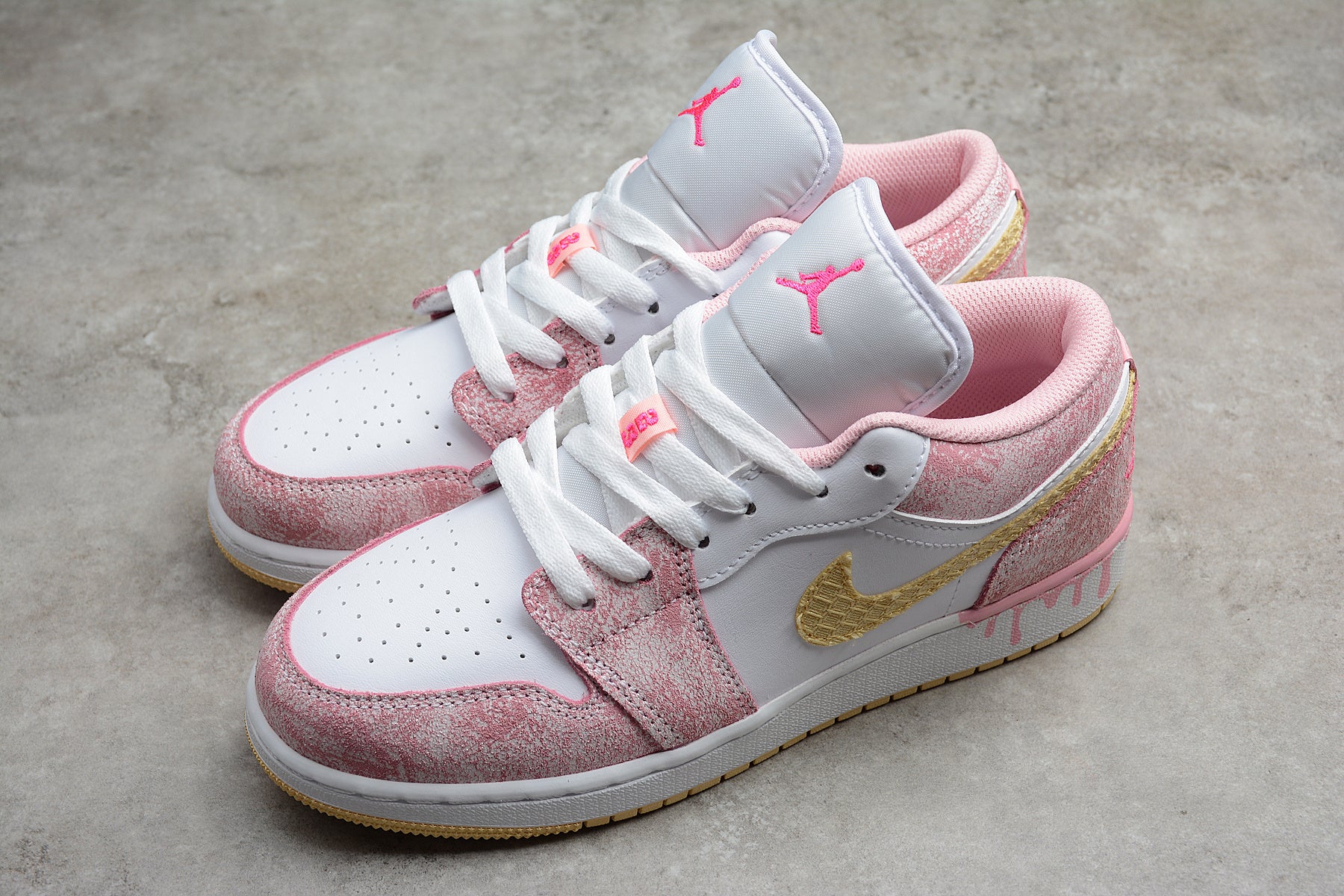Jordan 1 Low – Rosa / Blanco / Negro