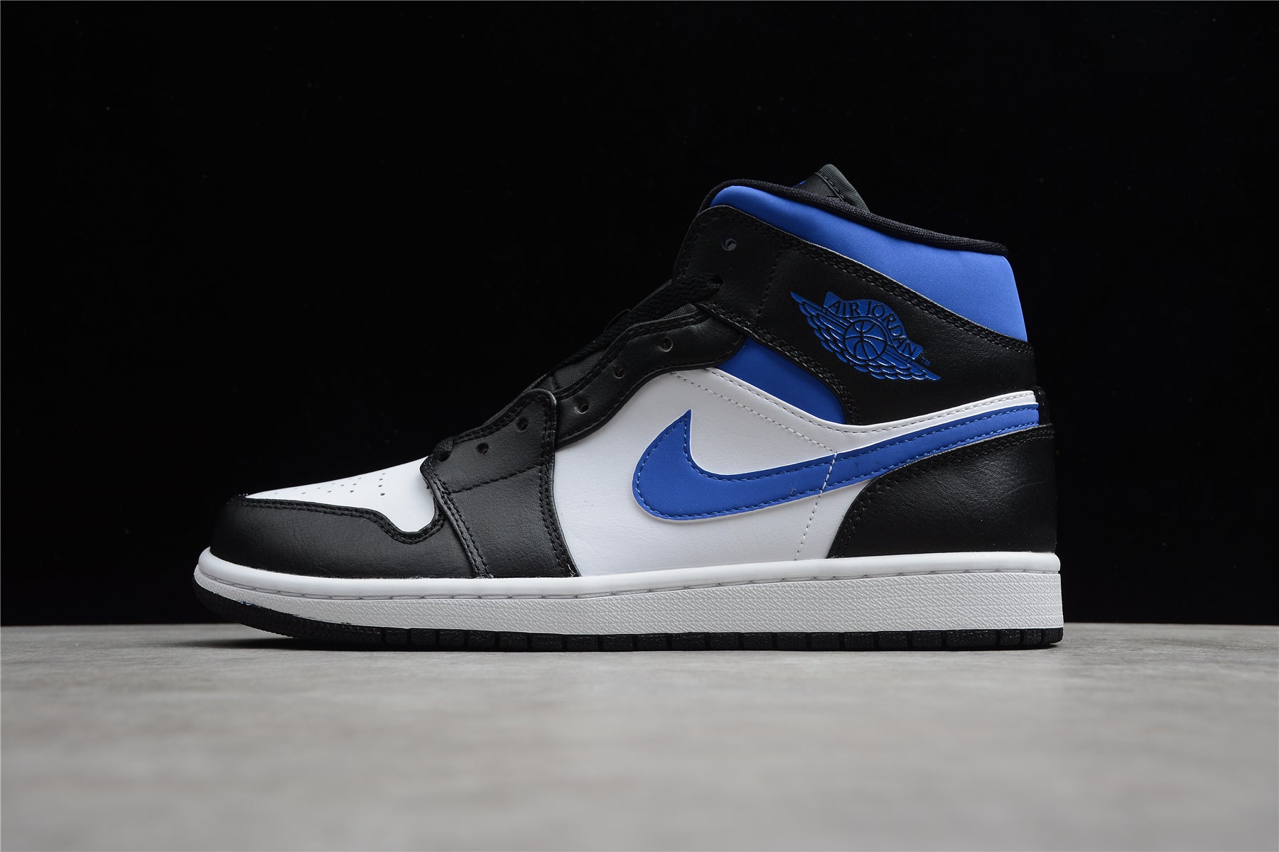 Air Jordan 1 Mid – Negro / Azul