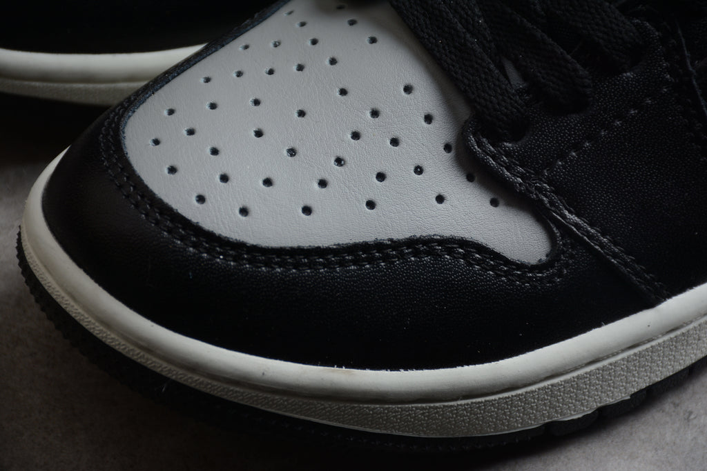 Jordan 1 Low – Negro / Gris