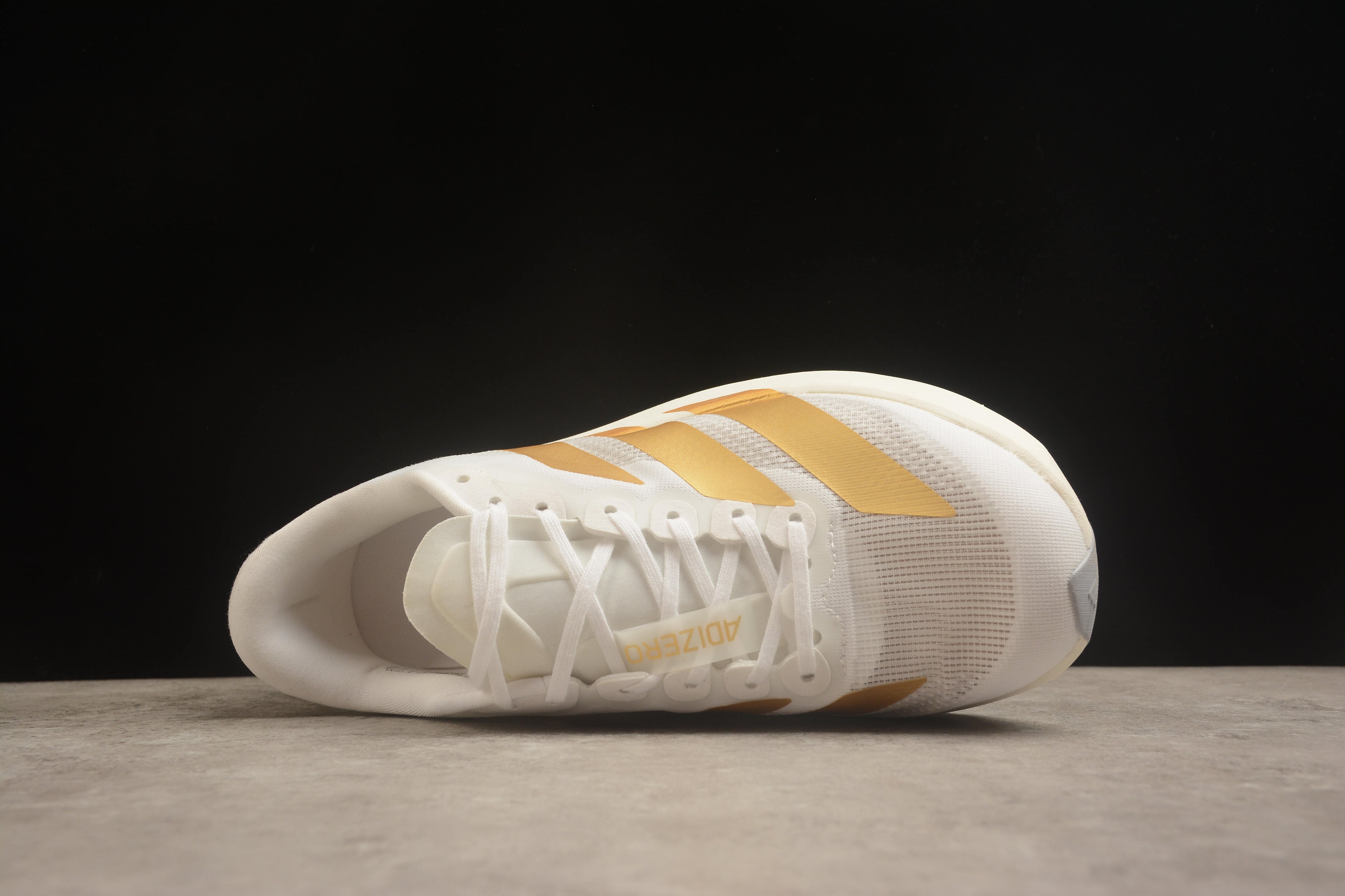 Adidas Adizero Evo SL – Blanco / Dorado