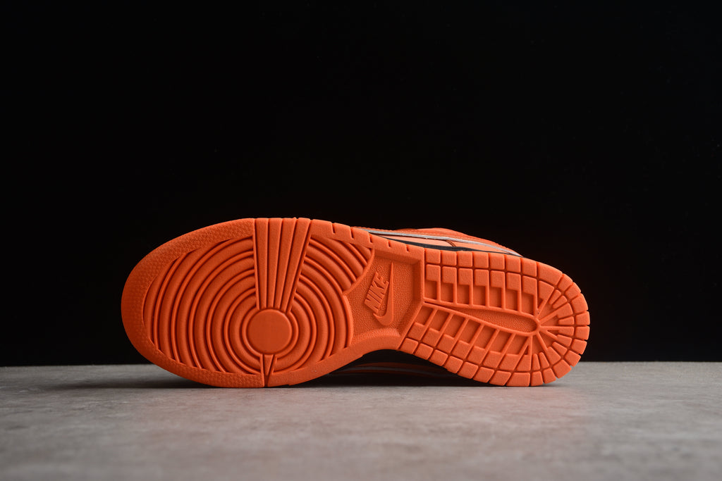 Dunk SB – Naranja / Blanco / Negro