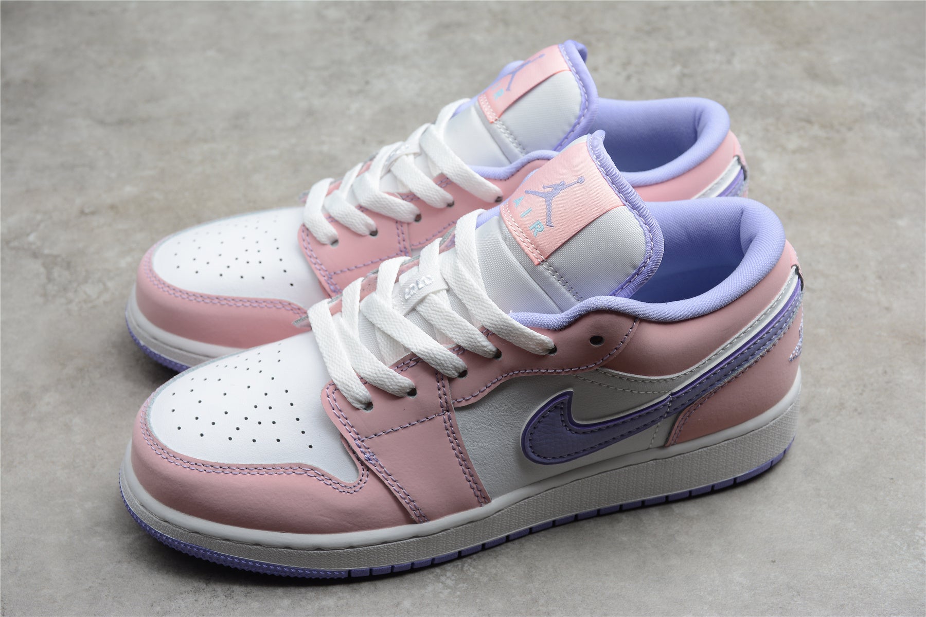 Jordan 1 Low – Rosa / Lila / Blanco