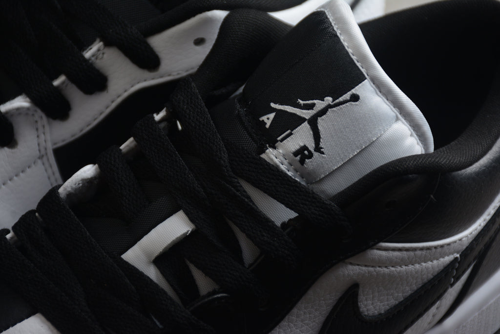 Jordan 1 Low – Negro / Blanco