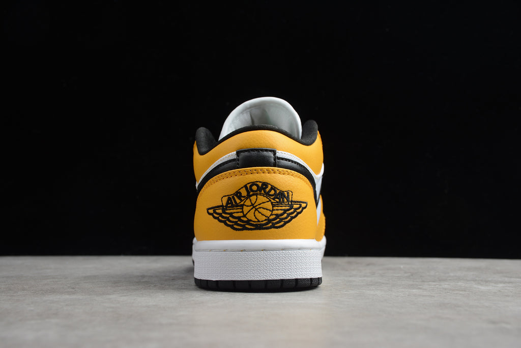 Jordan 1 Low – Amarillo / Blanco
