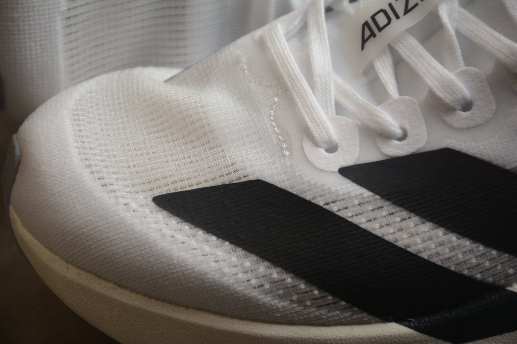 Adidas Adizero Evo SL – Blanco / Negro