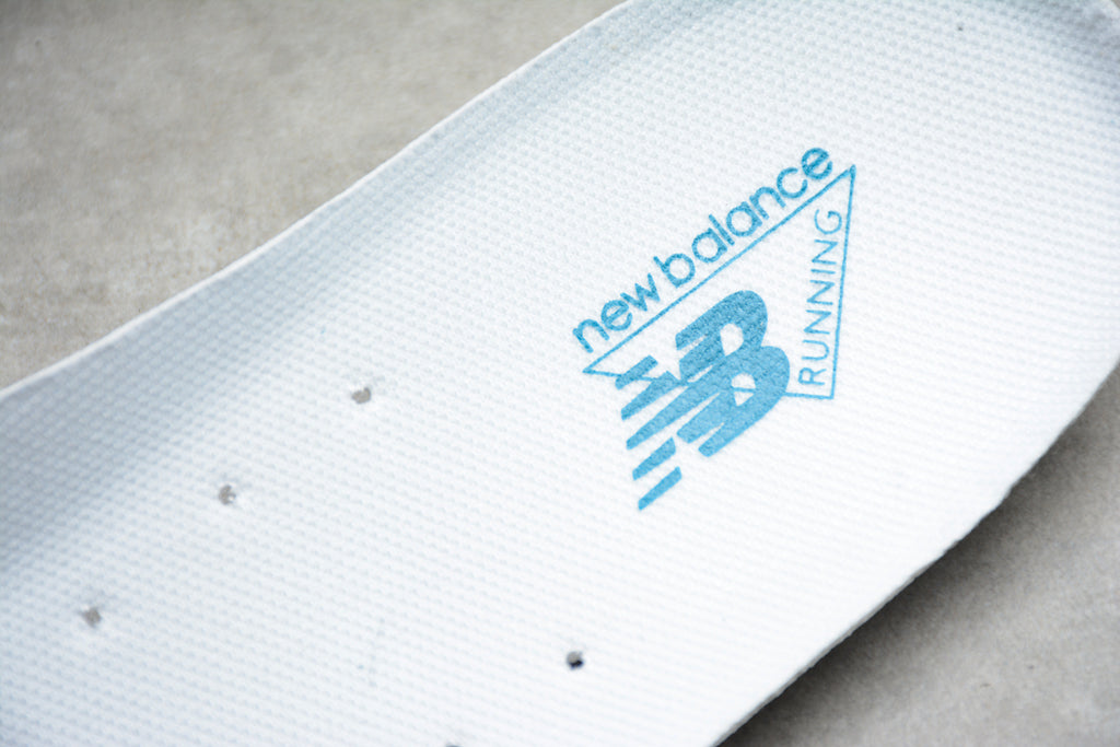 New Balance 2002R – Blanco / Azul