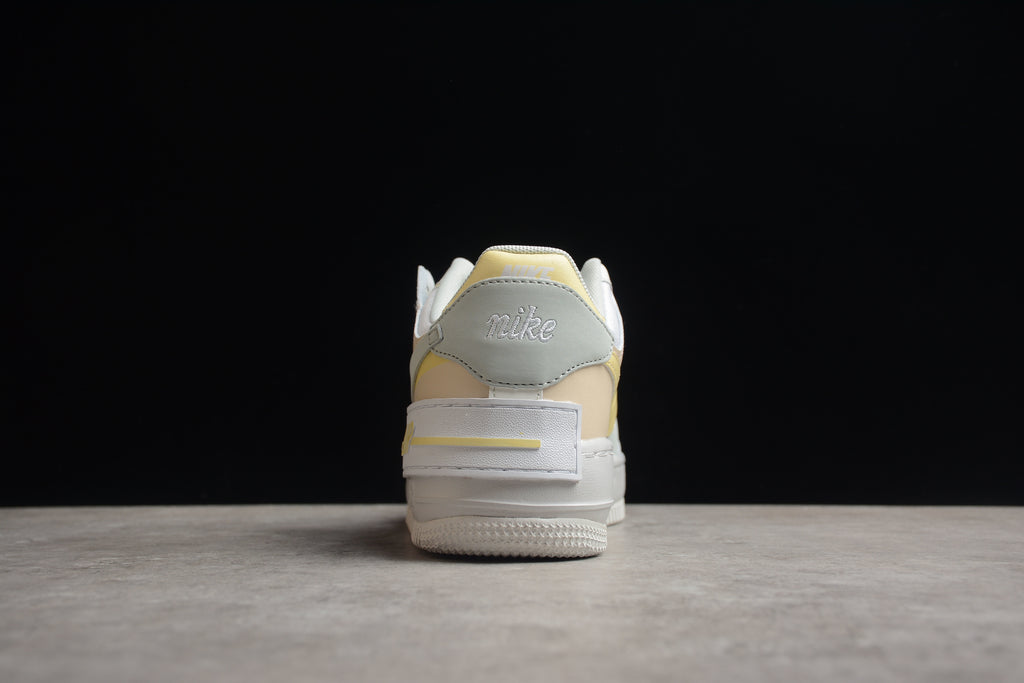 Air Force 1 Shadow – Gris / Rosa / Dorado