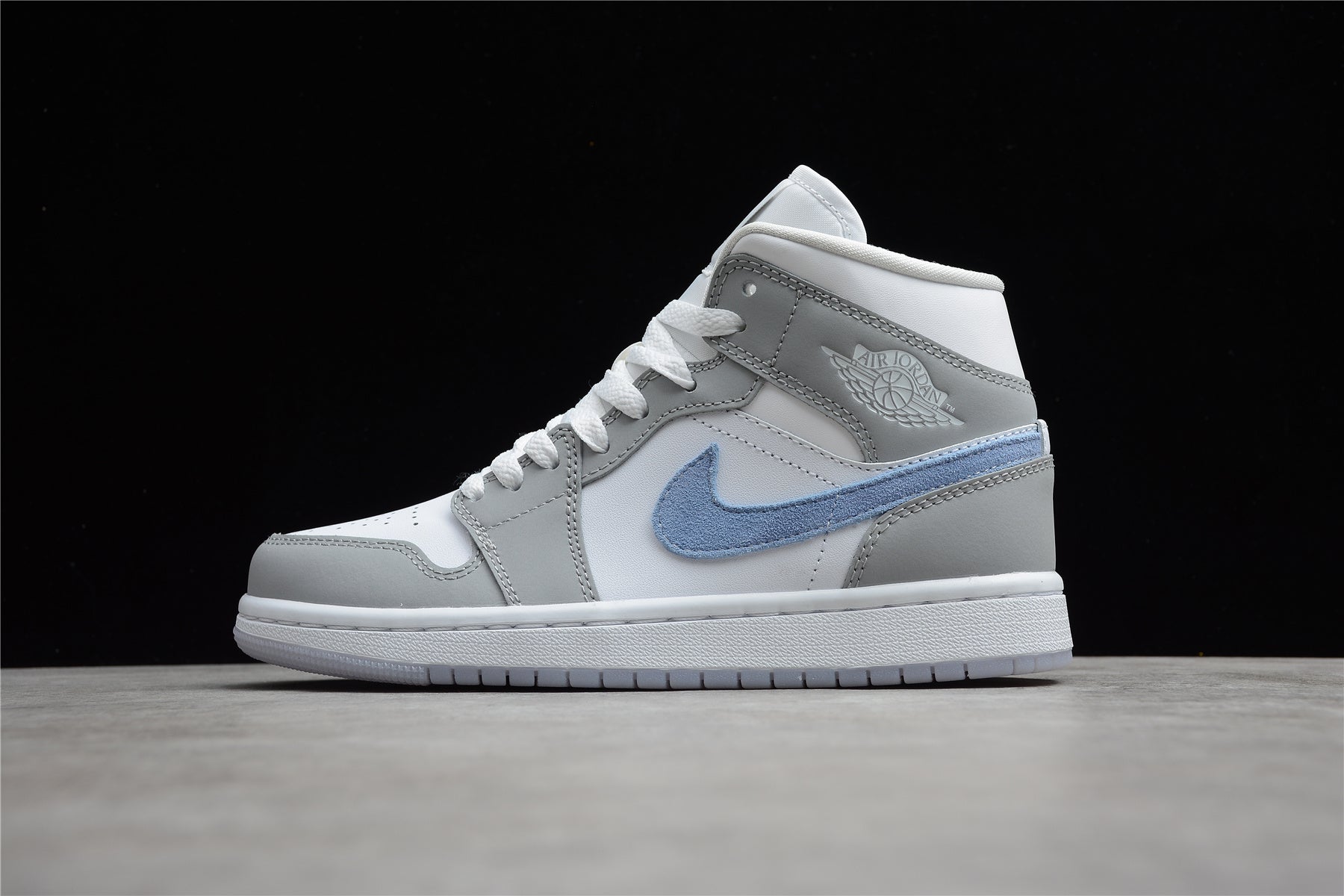 Air Jordan 1 Mid – Gris / Azul