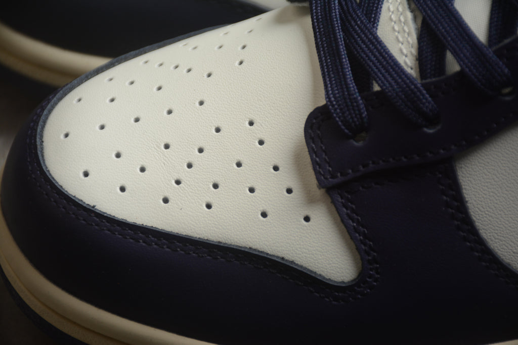 Dunk SB – Azul Oscuro / Blanco / Amarillo
