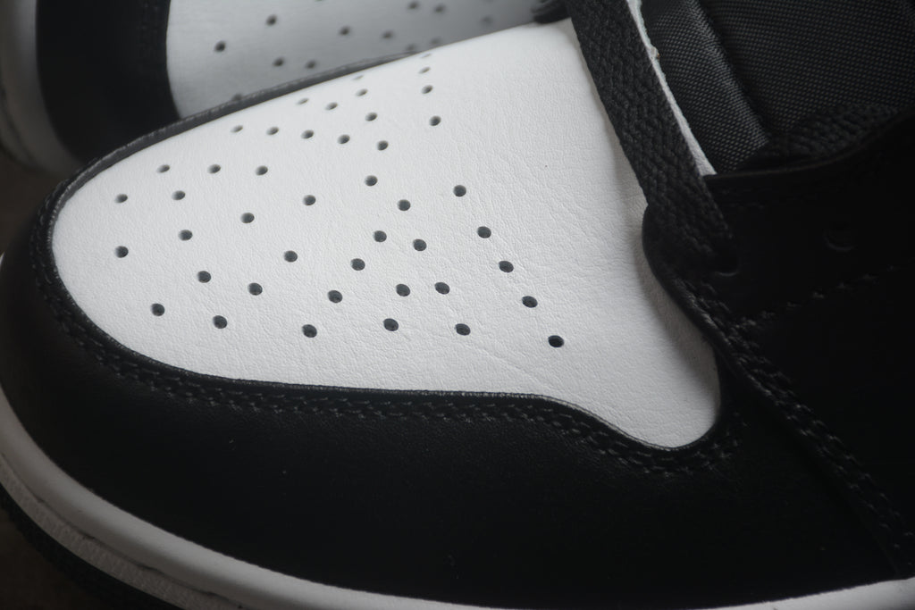 Air Jordan 1 Mid – Negro / Azul / Blanco