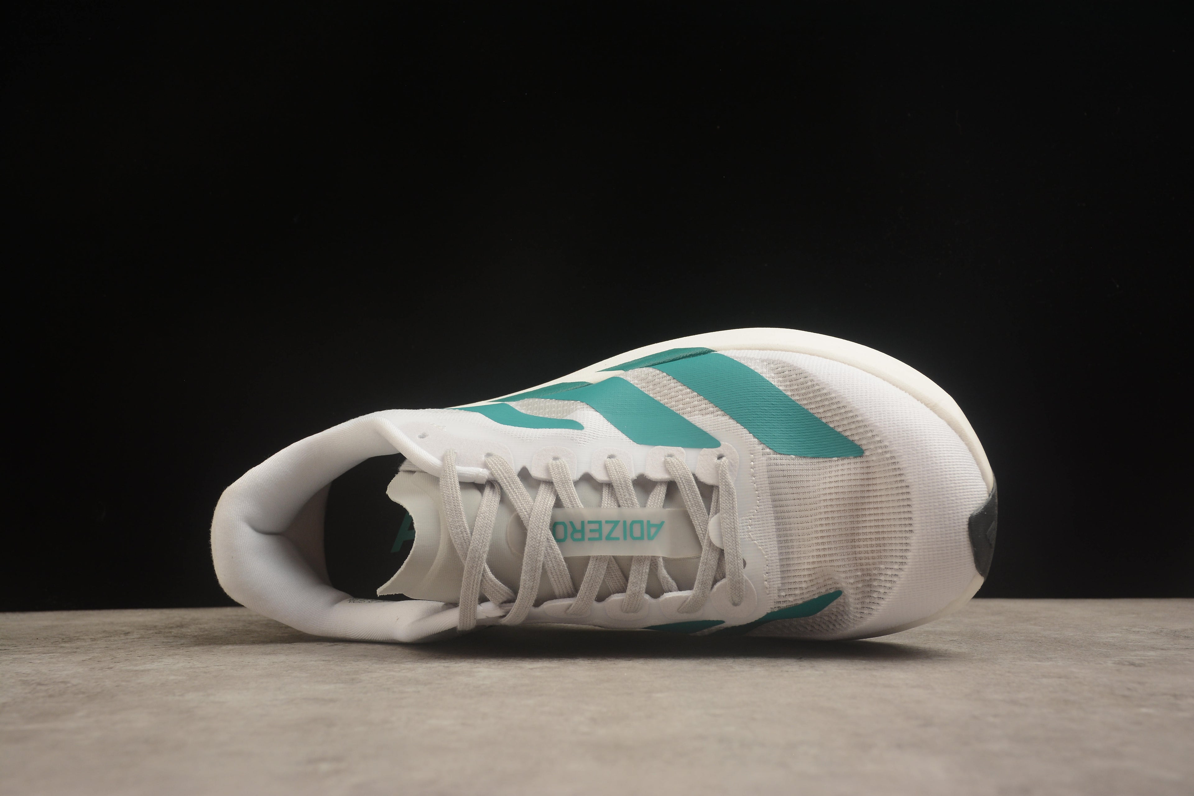 Adidas Adizero Evo SL – Blanco / Turquesa