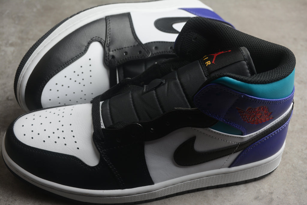 Air Jordan 1 Mid – Negro / Azul / Blanco