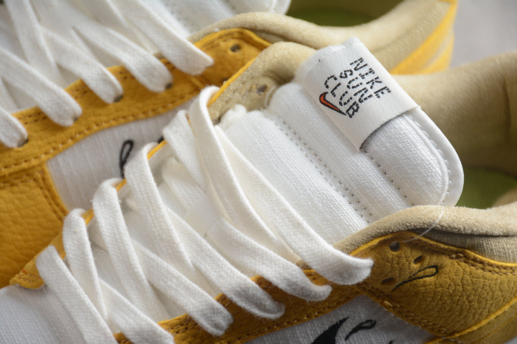 Dunk SB – Amarillo / Blanco / Negro