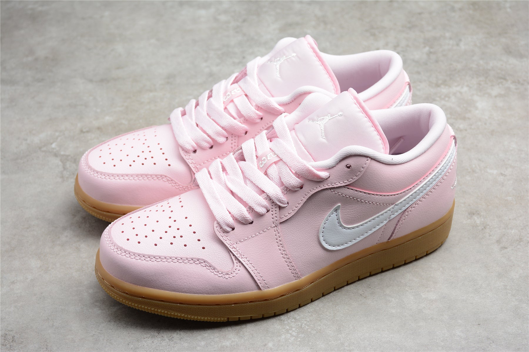 Jordan 1 Low – Rosa / Marrón