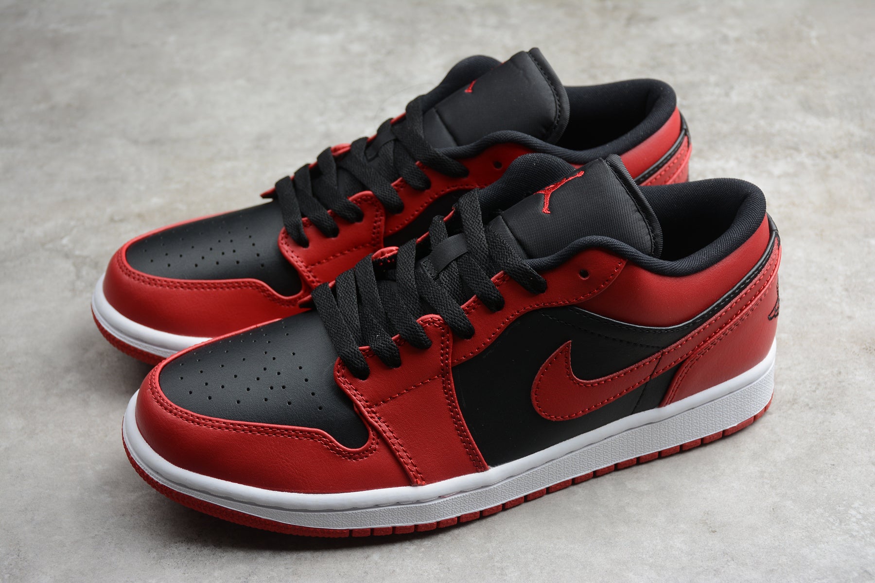 Jordan 1 Low – Rojo / Negro