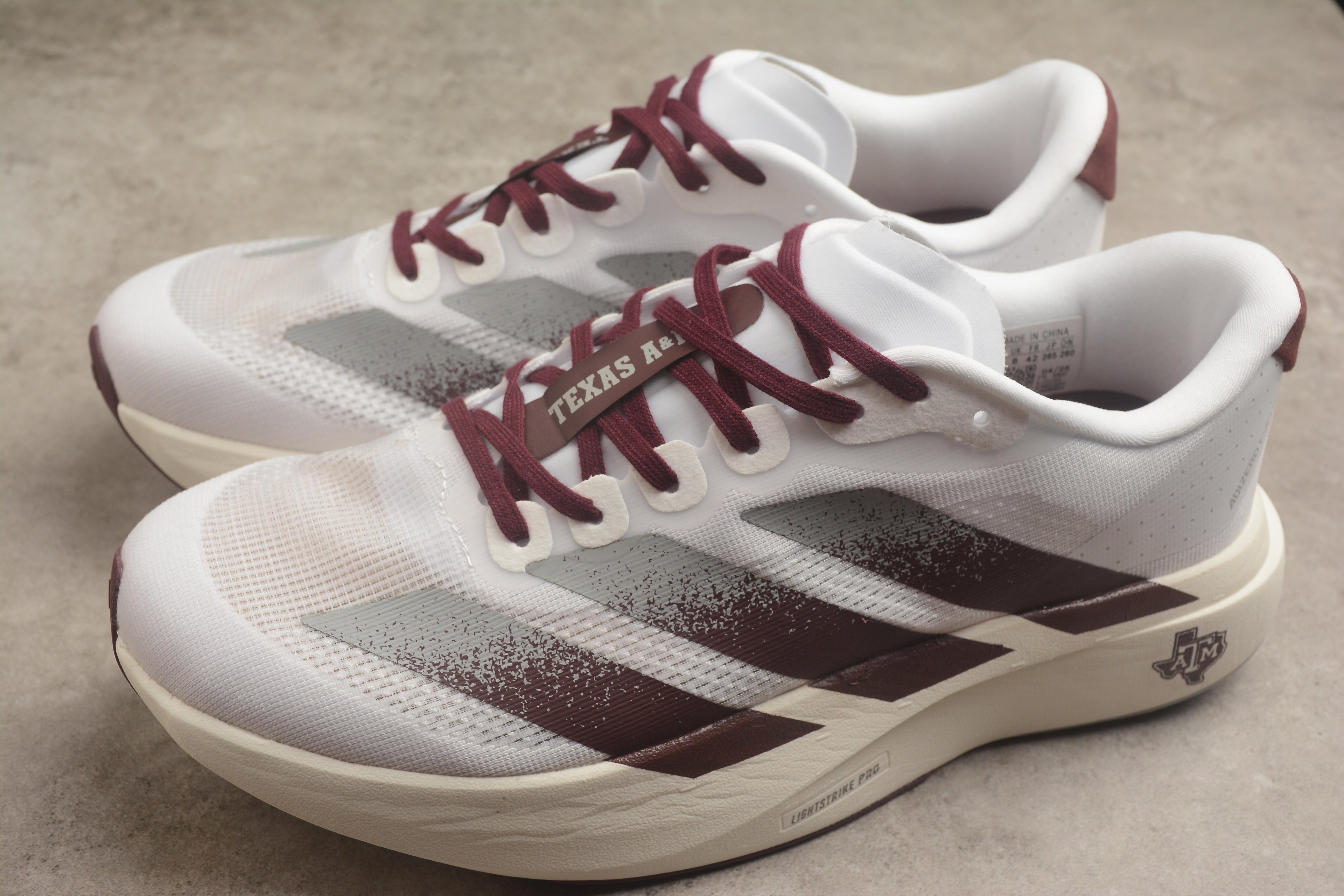 Adidas Adizero Evo SL – Blanco / Marrón