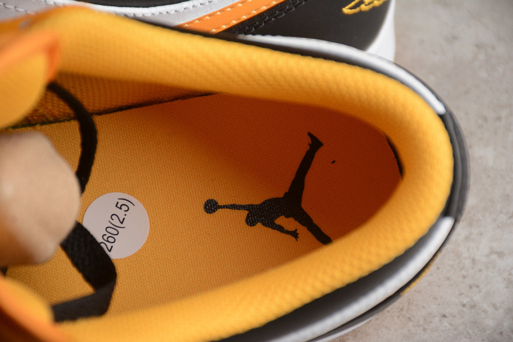 Jordan 1 Low – Amarillo / Blanco / Negro