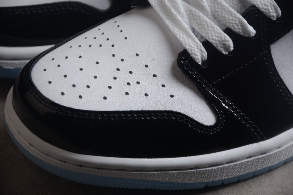 Jordan 1 Low – Negro / Blanco Brillante