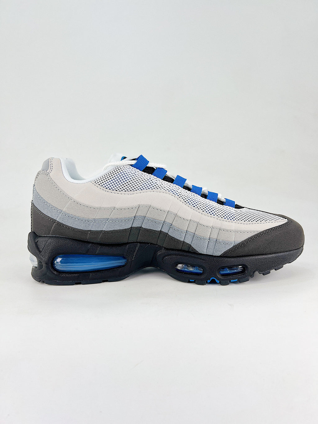 Air Max 95 – Negro / Blanco / Azul