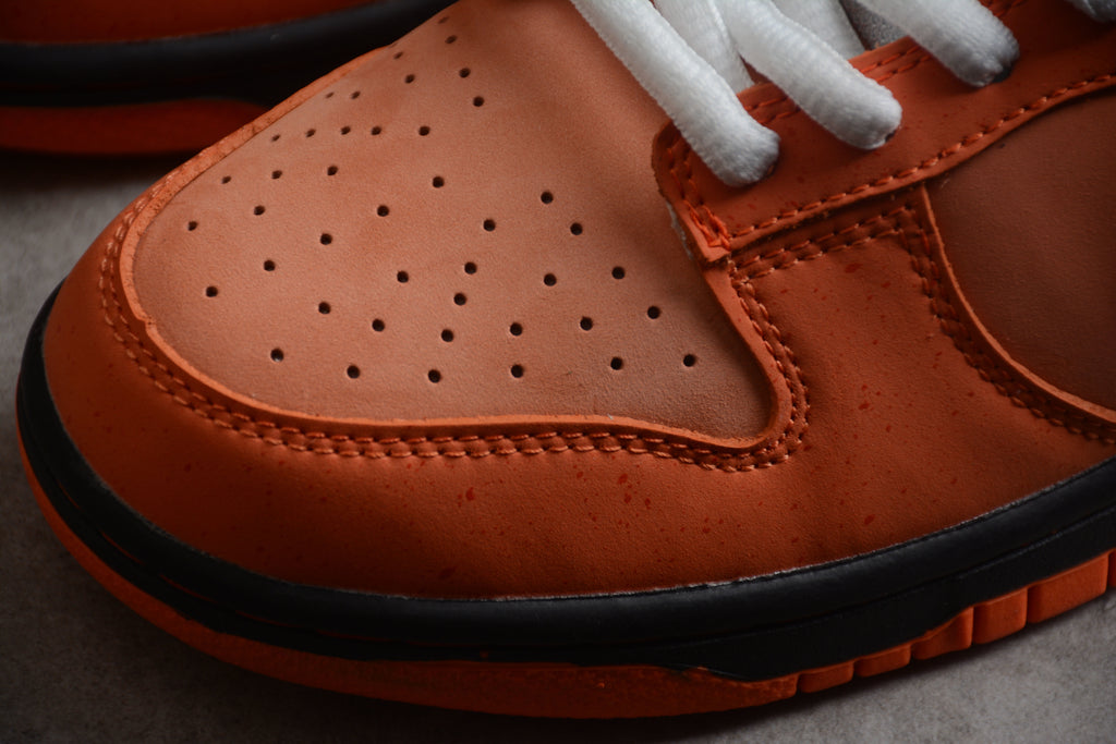 Dunk SB – Naranja / Blanco / Negro