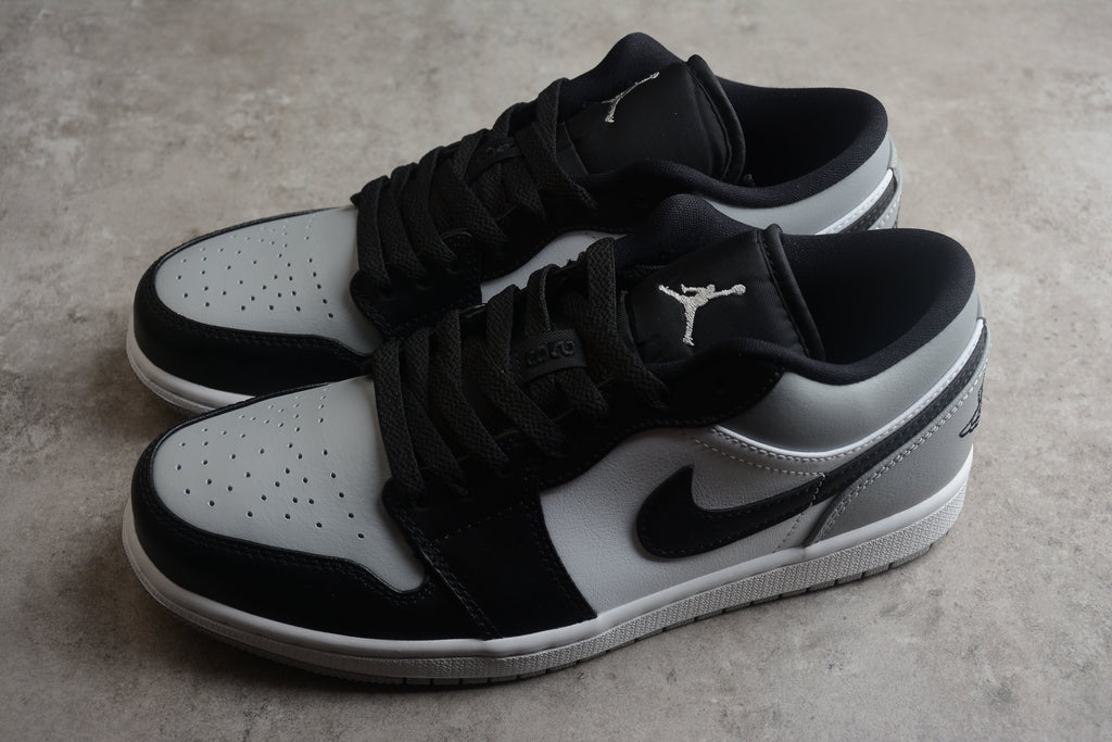 Jordan 1 Low – Beige / Negro / Blanco