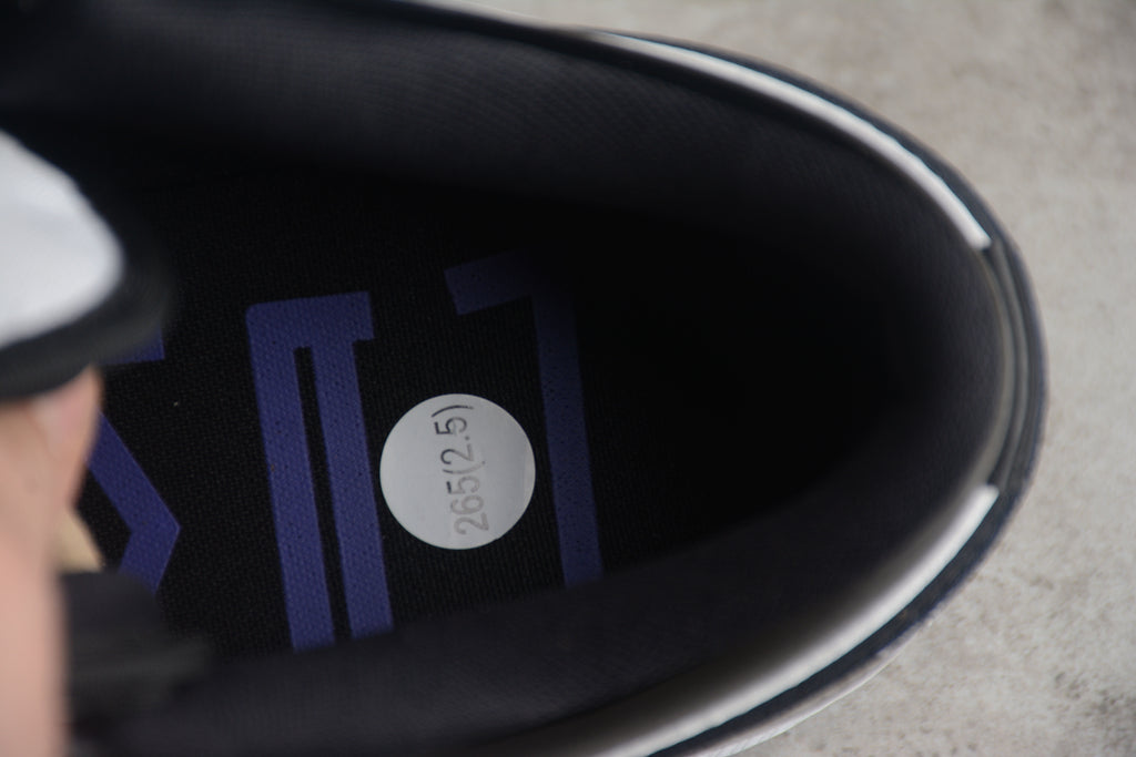 Jordan 1 Low – Negro / Blanco Brillante