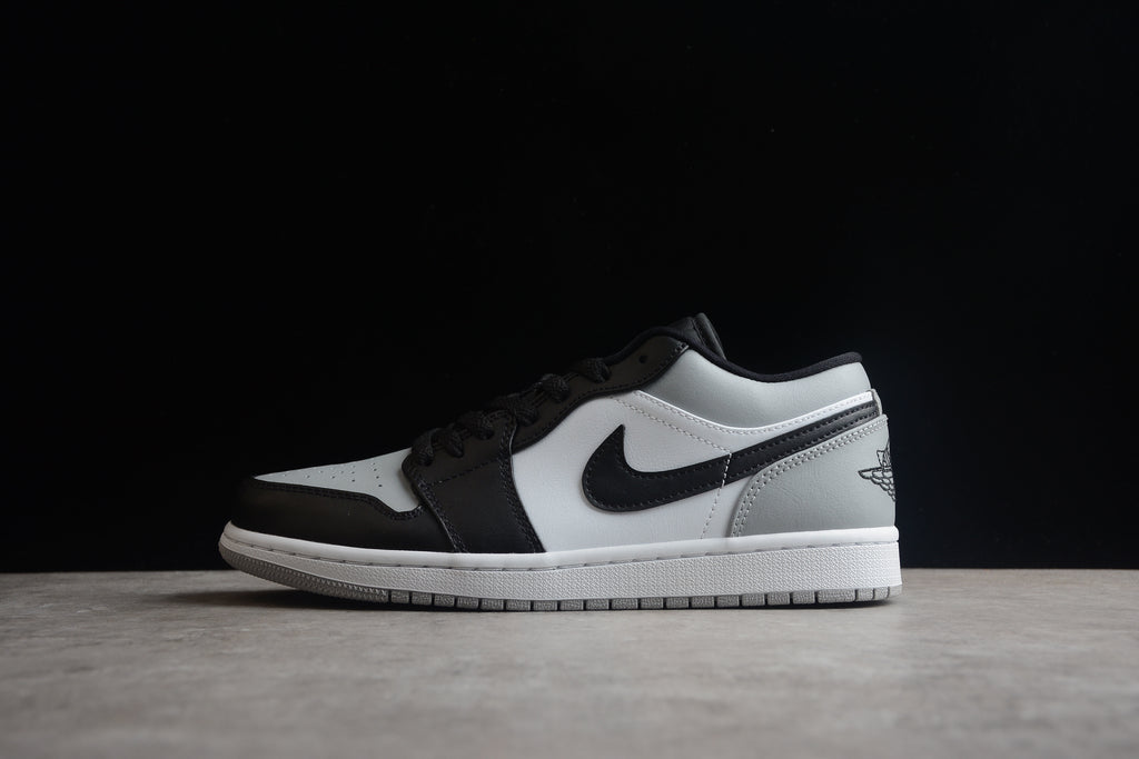 Jordan 1 Low – Beige / Negro / Blanco