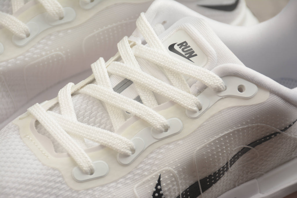 Vomero Premium – Blanco / Rosa